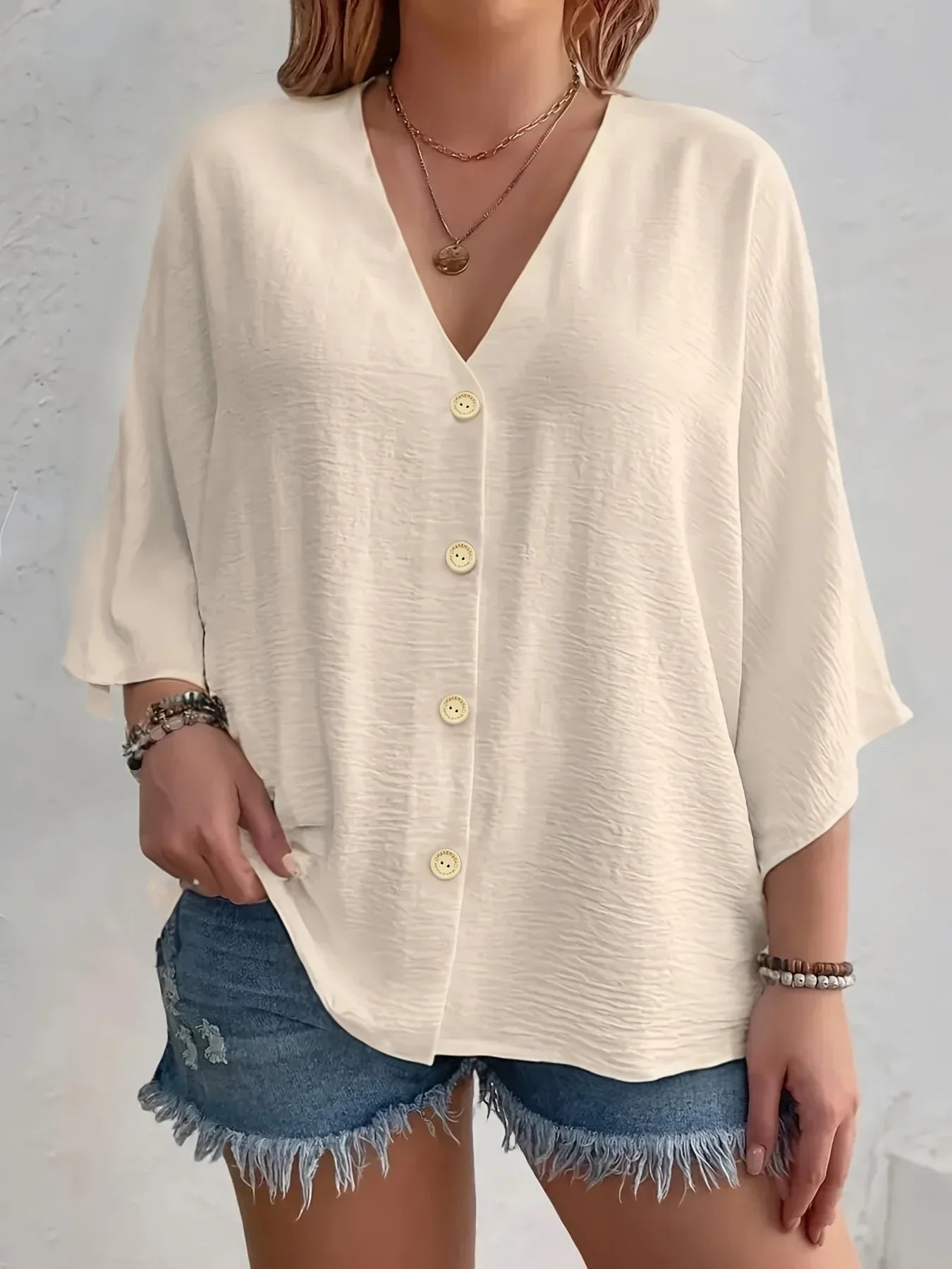 Birgitta | Signe – Blus med knäppning och ¾-ärm