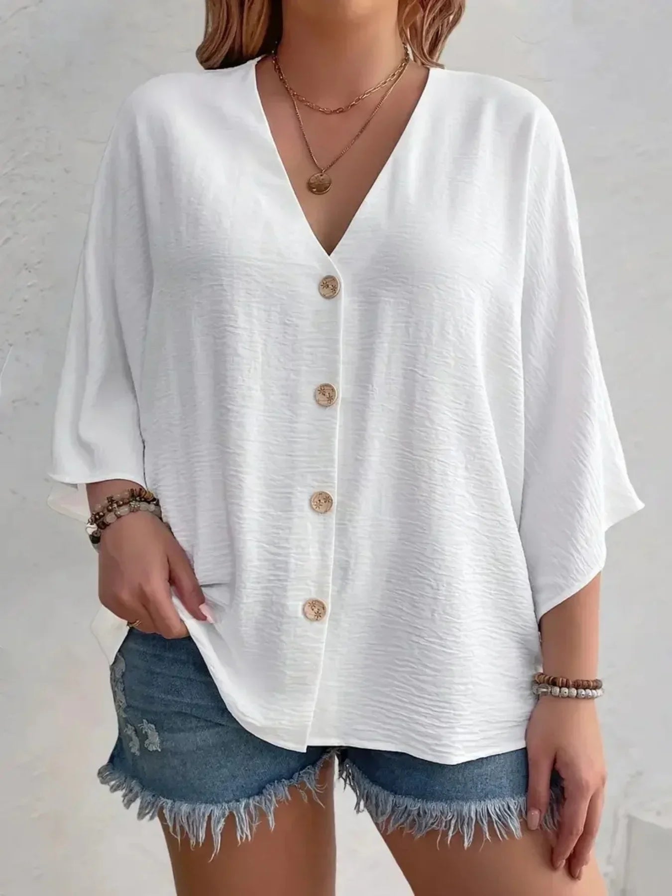 Birgitta | Signe – Blus med knäppning och ¾-ärm